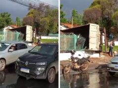 Caminhão derruba semáforo, “leva” muro e tomba dentro de Batalhão do Exército em Cuiabá